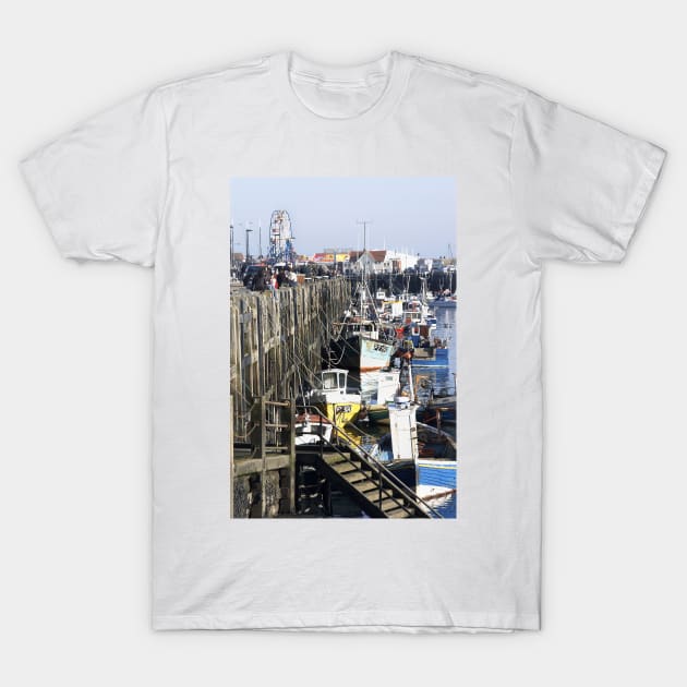 Fishing boats moored along Scarborough sea front, Yorkshire, UK T-Shirt by richflintphoto